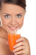Young woman with glass of carrot juice Young woman with glass of carrot juice