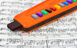 Toy pipe and sheet music