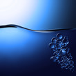 water waves and bubbles on a blue background water waves and bubbles on a blue background