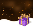Present with gold ribbon and bow