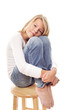 Girl on a wooden stool