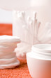 facial cream and cotton pads