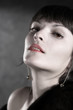 beautiful seductive girl with brown eyes.