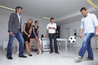 Businessman playing football
