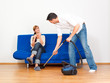 man homework with vacuum cleaner