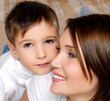 Pretty little son and her mother