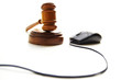 Photo: computer mouse and judges court gavel, on white computer mouse and judges court gavel, on white