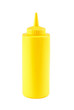 Yellow mustard bottle isolated on white