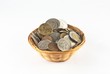 Foto: Collection of coins into baskets Collection of coins into baskets