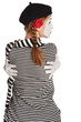 Mime girl hugging herself Mime girl hugging herself