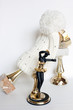 Golden trophy cups with cap and dancer statuette