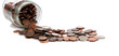 a Spilt jar of change on white