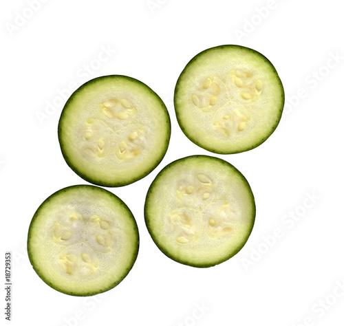 Photo: fresh slices of organic zucchini courgette Cucurbita pepo fresh slices of organic zucchini courgette Cucurbita pepo