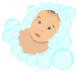 small kid in soap bubbles