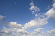 Clouds in sunny blue sky