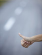 hand hitchhike on empty road travel adventure hand hitchhike on empty road travel adventure