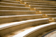 ancient stages and seats from a yellow granit stone