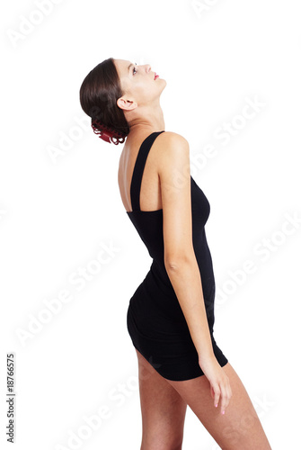Photo: nice girl in a dress looking up nice girl in a dress looking up