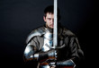 Foto: Warrior holding his great sword Warrior holding his great sword