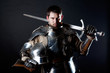 Great knight holding his sword and helmet