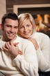 Couple hugging at home