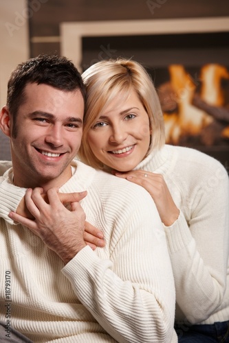 Photo: Couple hugging at home Couple hugging at home