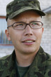 Foto: Young army cadet with glasses Young army cadet with glasses