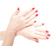 Photo: Fingers with red nails on white. Fingers with red nails on white.