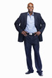 Foto: Confident business man standing on white background Confident business man standing on white background