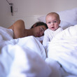Father and Baby in Bed