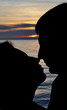 silhoettes of kissing couple silhoettes of kissing couple