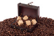 Coffee grains and sugar pieces