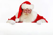 santa holding white banner