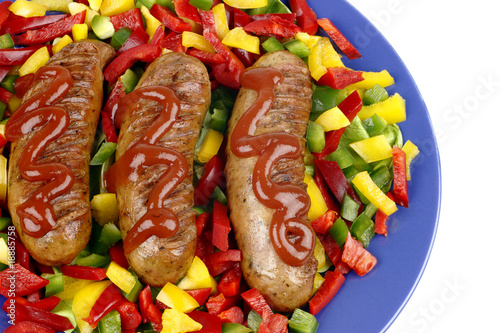 Sausage and paprika on a plate. Sausage and paprika on a plate.