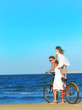 woman and girl  on the beach