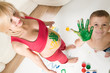 woman and her son drawing