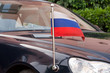 Car of Russian Diplomatic Corps to the flag of Russia
