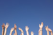 Foto: Arms Raised Against Blue Sky Arms Raised Against Blue Sky