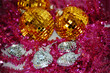 Xmas hearts and balls in tinsel