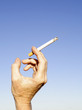 Photo: holding a cigarette holding a cigarette