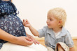 pregnant woman and little boy