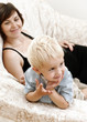 pregnant woman and little boy