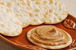 creamy and delicious swirl of peanut butter on a cracker creamy and delicious swirl of peanut butter on a cracker