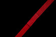 Red ribbon on black background