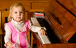Young girl about piano