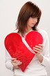 Young beauty woman with broken heart
