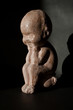 Enfant sur le pot (terre cuite)