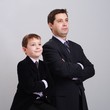 Father and son in suit