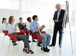 Foto: Business people applauding at the end of a conference Business people applauding at the end of a conference