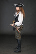 Sea pirate with weapon on black background
